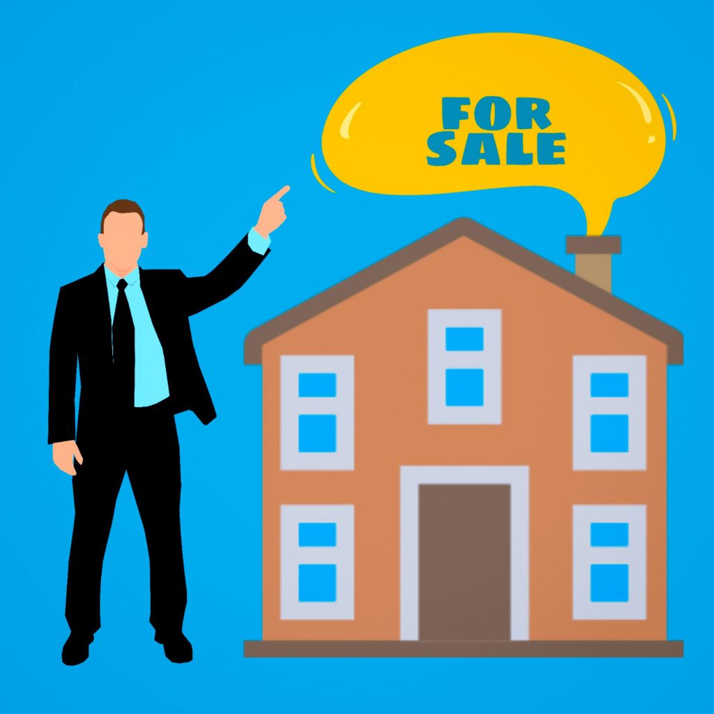 agente inmobiliario vendiendo una casa 